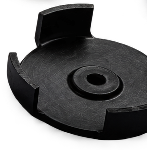 Black circular molded polymer component with raised tabs