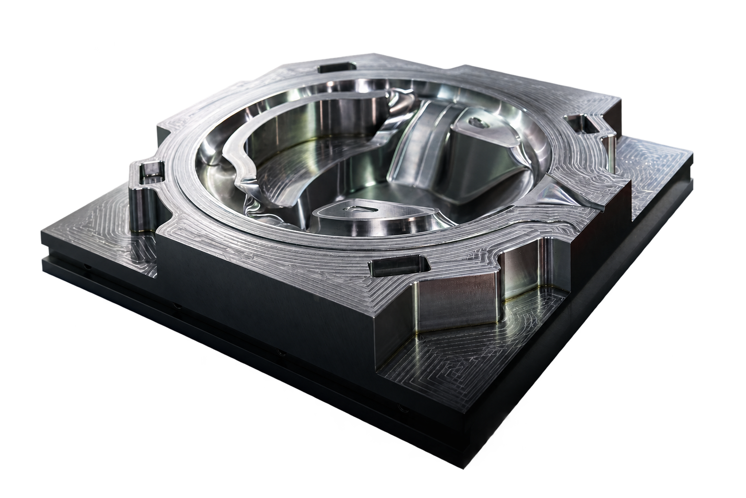 Machined metal mold cavity with detailed pockets and contoured surfaces